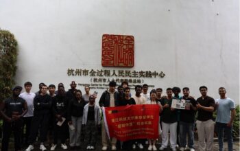 International students from ZUST at the Hangzhou Center for Practicing Whole-Process People's Democracy, Xiaoying Lane.