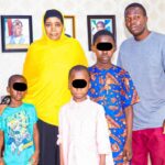 The DG NAPTIP, Binta Adamu Bello, OON with the Father of one of the Survivors shortly before reunion with their families.